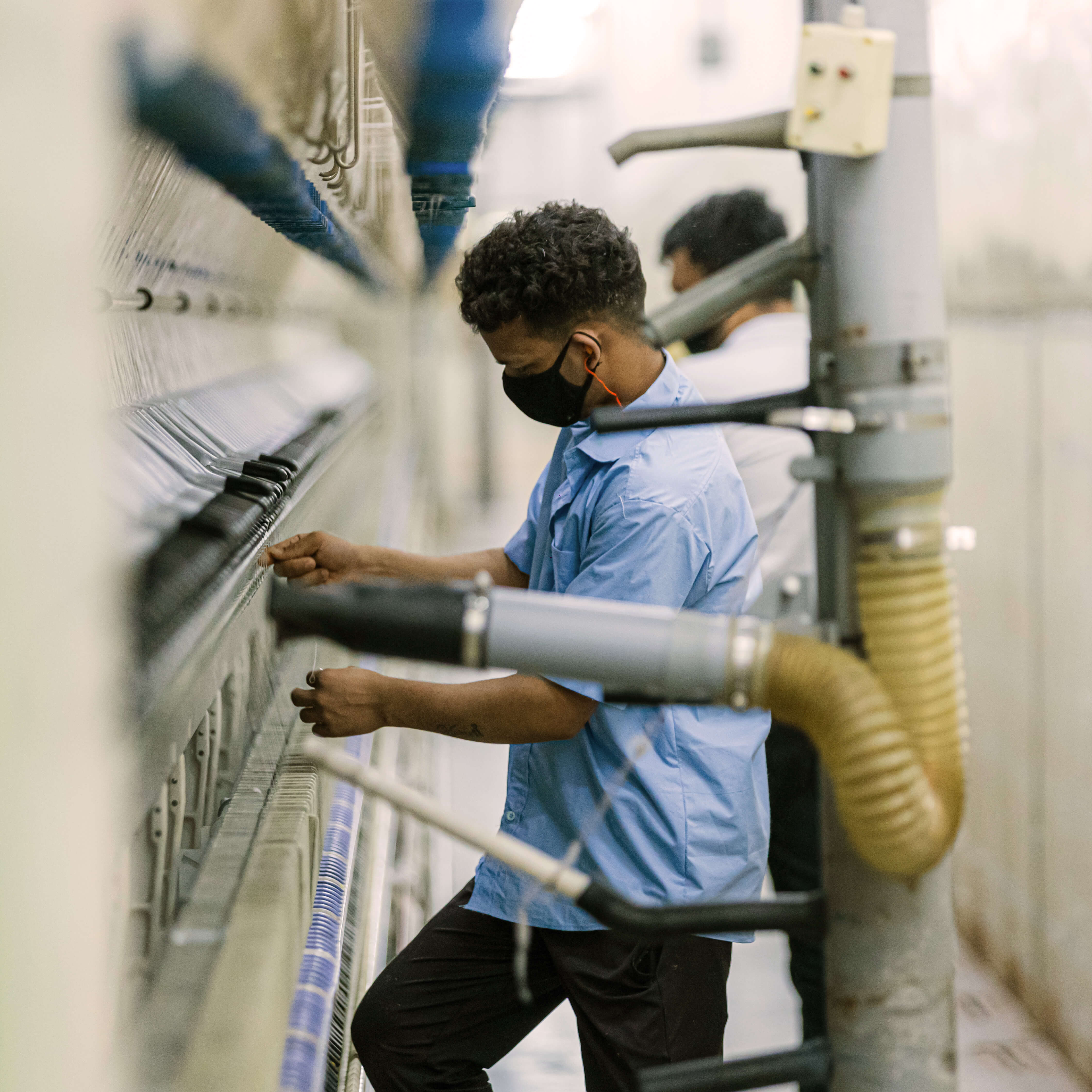 a worker in a mask